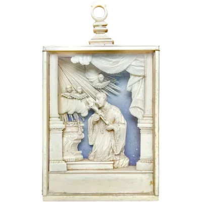 Ivory sculpture in a display case. Trapani, Sicily.