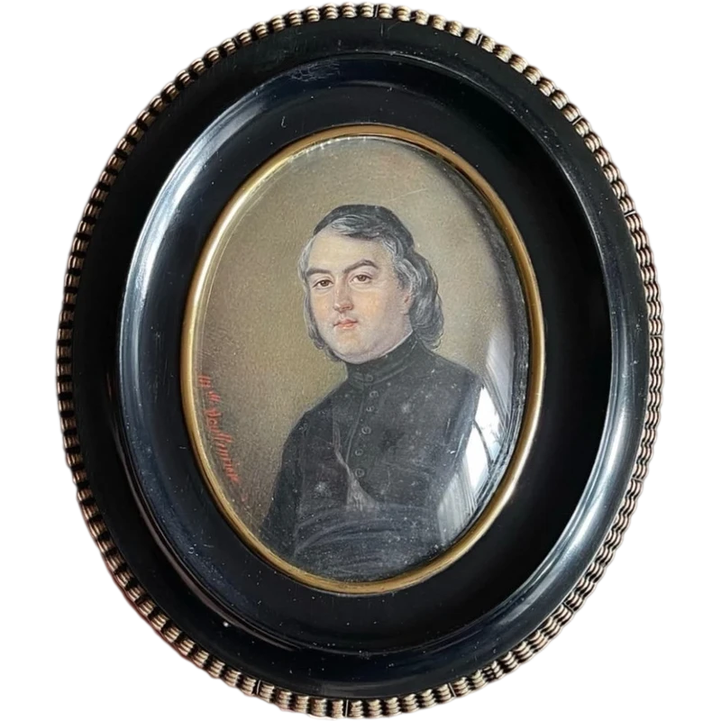 Miniature oil painting on bone plate depicting a male figure.