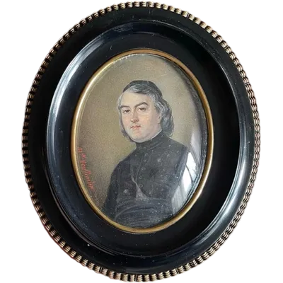 Miniature oil painting on bone plate depicting a male figure.
