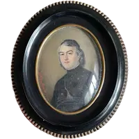Miniature oil painting on bone plate depicting a male figure.