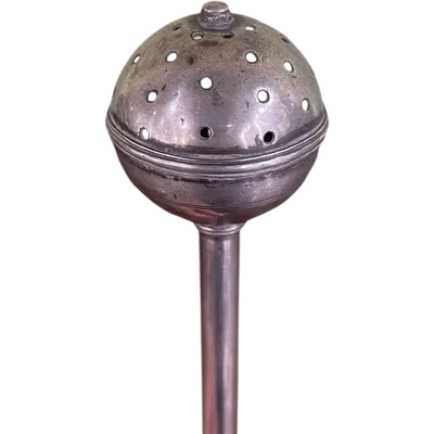 A spherical silver holy water sprinkler,