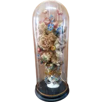 Cloche ancienne en verre soufflé, vase en céramique et fleurs en tissu, XIXe siècle.