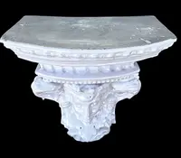White majolica shelf featuring a female figure, dolphins, and geometric marine motifs. Faenza