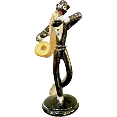 A jazz musician figurine made of heavy black glass. Seguso, Murano.