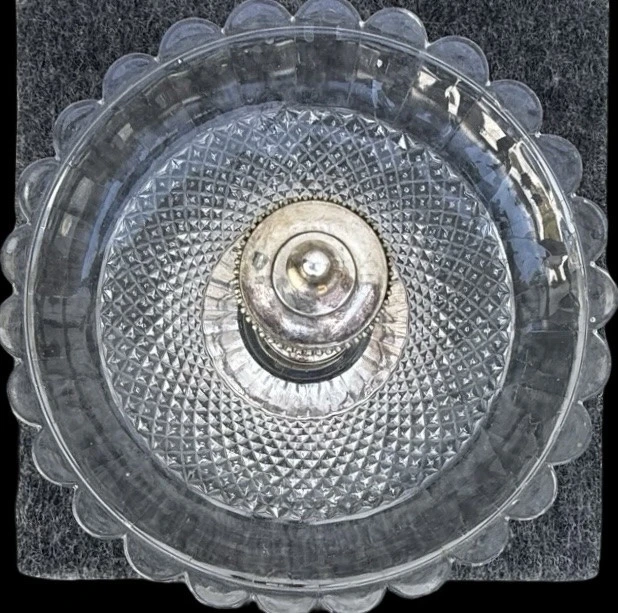Centerpiece - silver-plated metal fruit bowl with a wide base and molded handle