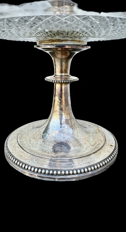 Centerpiece - silver-plated metal fruit bowl with a wide base and molded handle