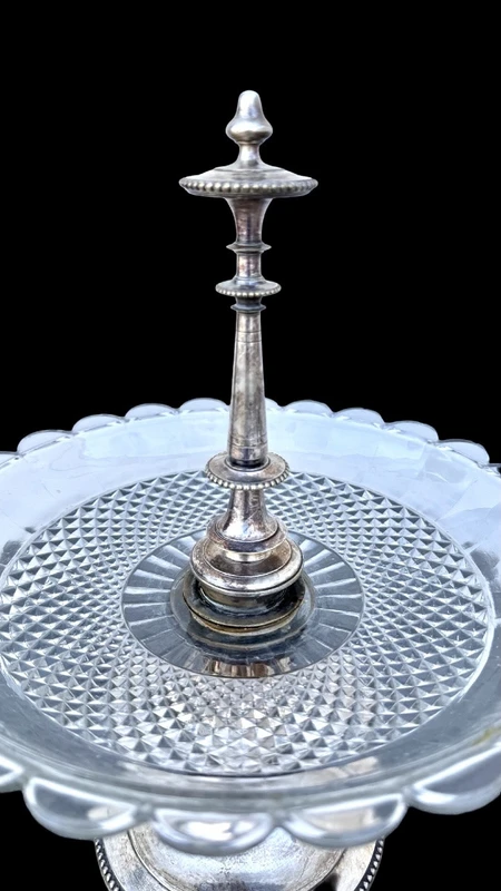 Centerpiece - silver-plated metal fruit bowl with a wide base and molded handle