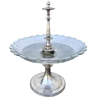 Centerpiece - silver-plated metal fruit bowl with a wide base and molded handle