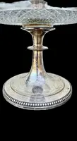 Centerpiece - silver-plated metal fruit bowl with a wide base and molded handle
