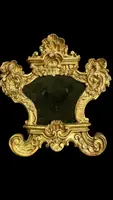 Paire de cartaglories en bois sculpté et feuille d'or