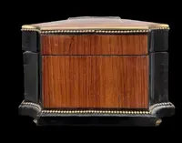Wooden box inlaid with geometric patterns and a painted porcelain medallion