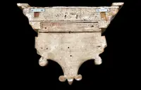 Carved wooden wall-mounted shelf with Mecca gilding and a marble top,