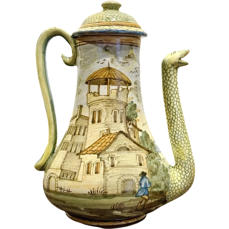 Cafetière en faïence, de forme piriforme, avec un bec verseur en forme de serpent.