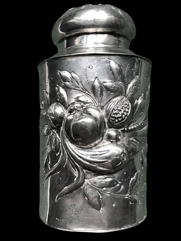 Embossed silver tea box with fruit motifs. Germany.