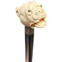 Bastone con pomolo in avorio raffigurante cane molosso.