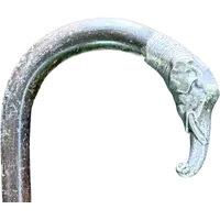 A walking stick with a silver knob shaped like an elephant's head.