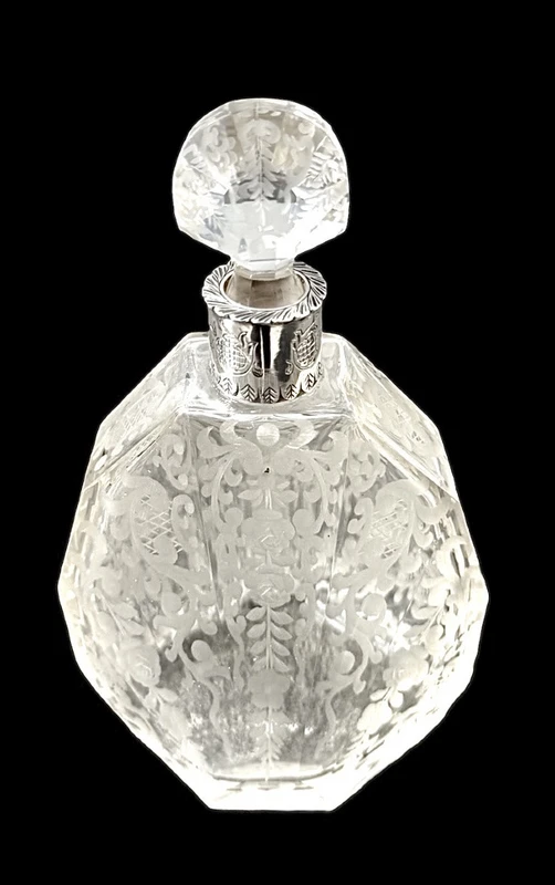 Small octagonal-shaped perfume bottle made of cut crystal