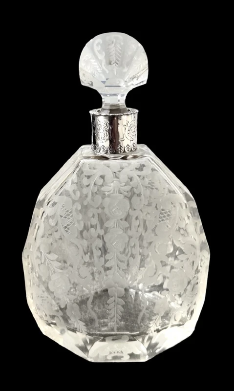 Small octagonal-shaped perfume bottle made of cut crystal