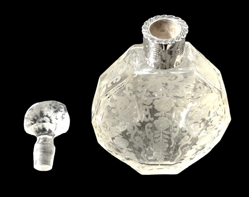 Small octagonal-shaped perfume bottle made of cut crystal