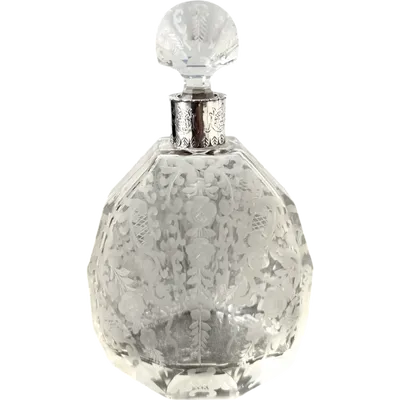 Small octagonal-shaped perfume bottle made of cut crystal