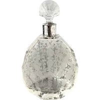 Small octagonal-shaped perfume bottle made of cut crystal