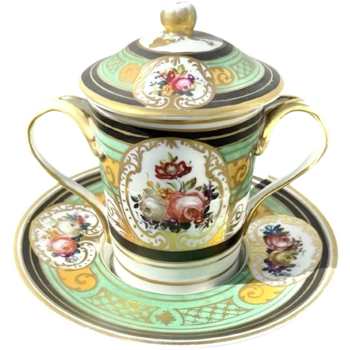 Porcelain maternity mug with floral patterns, geometric motifs, and gold accents.