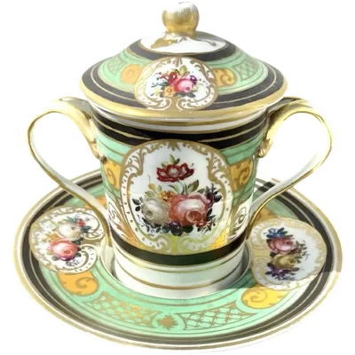 Porcelain maternity mug with floral patterns, geometric motifs, and gold accents.
