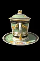 Porcelain maternity mug with floral patterns, geometric motifs, and gold accents.