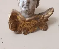 Tête de chérubin ancienne en bois laqué et doré