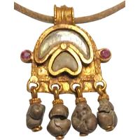 Byzantine magical amulet made of pure gold, rubies, glass paste, and 4 bezoars.