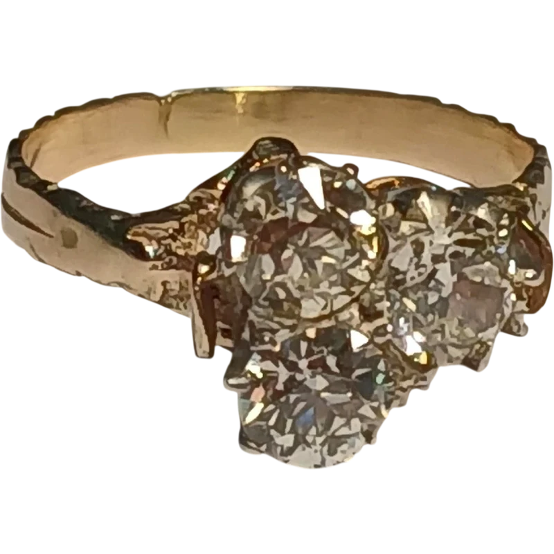 Art Nouveau gold ring with three brilliant-cut diamonds totaling approximately 1.60 kt. White stones in a 19th-century cut.
