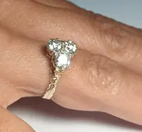 Art Nouveau gold ring with three brilliant-cut diamonds totaling approximately 1.60 kt. White stones in a 19th-century cut.