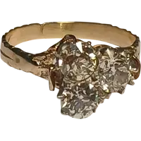 Art Nouveau gold ring with three brilliant-cut diamonds totaling approximately 1.60 kt. White stones in a 19th-century cut.