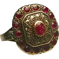  Gold and silver ring with a central ruby surrounded by rubies and diamond roses. Sicily 