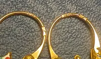Rari orecchini scaramantici a 'paniere' in oro e smalti. Sicilia, tra settecento e ottocento.