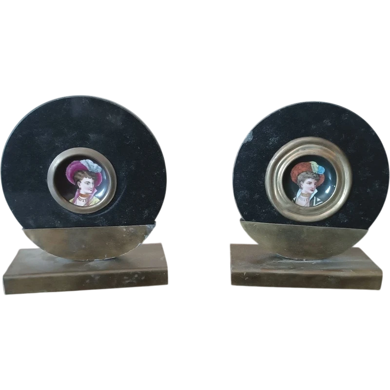 Pair of miniatures painted on a marble frame, 1920s, France