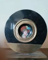 Pair of miniatures painted on a marble frame, 1920s, France