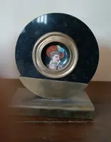 Pair of miniatures painted on a marble frame, 1920s, France