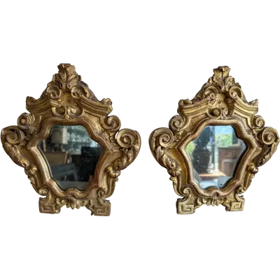 Pair of Genoese Louis XV-style small mirrors in carved and gilded wood – 18th century