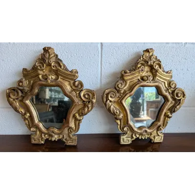 Pair of Genoese Louis XV-style small mirrors in carved and gilded wood – 18th century