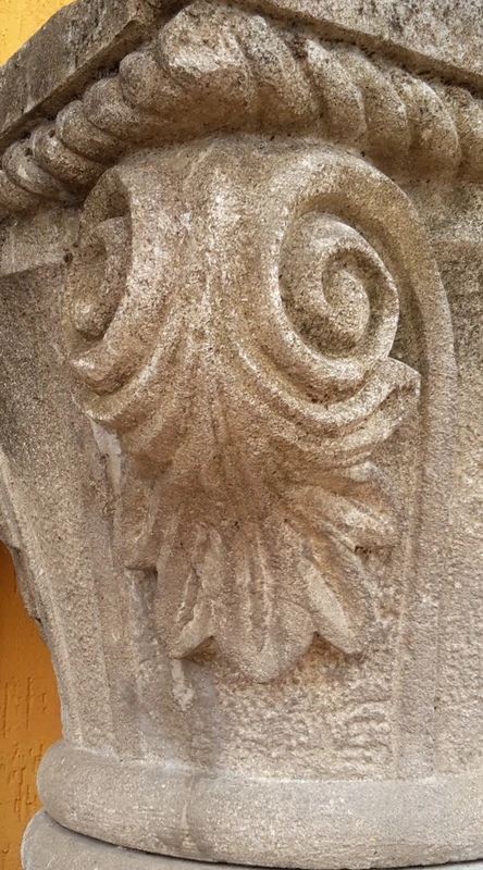 Lower carved stone capital