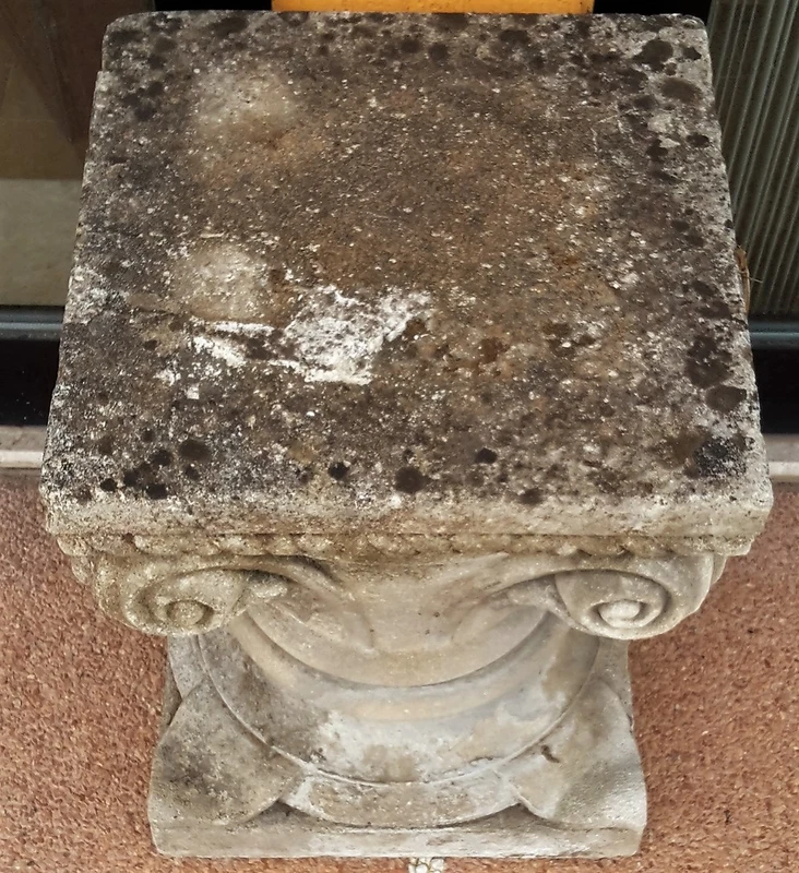 Lower carved stone capital