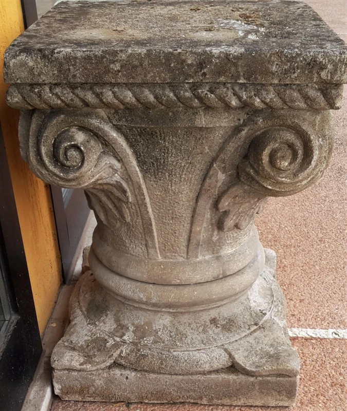 Lower carved stone capital
