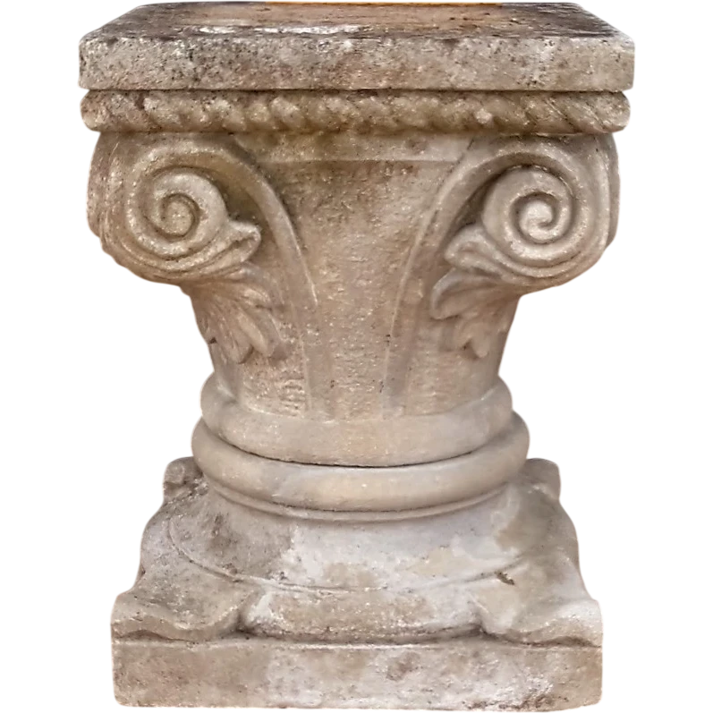 Lower carved stone capital