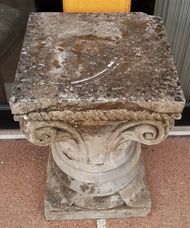 Carved stone capital