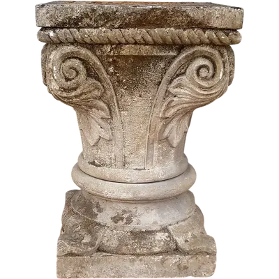 Carved stone capital