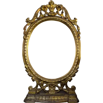 Cornice ovale da appoggio in legno intagliato e dorato a mecca