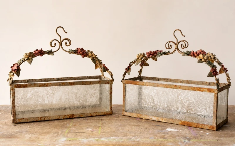 Pair of wrought-iron and glass planters, Ligurian Riviera, 1950s