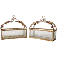 Pair of wrought-iron and glass planters, Ligurian Riviera, 1950s