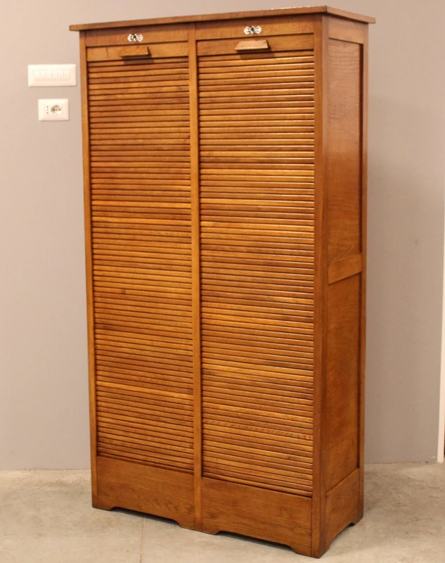 Antique oak filing cabinet with sliding doors